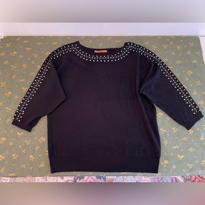 Black knit sweater with metallic detail